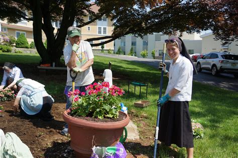 Sisters of Christian Charity beautify grounds in .